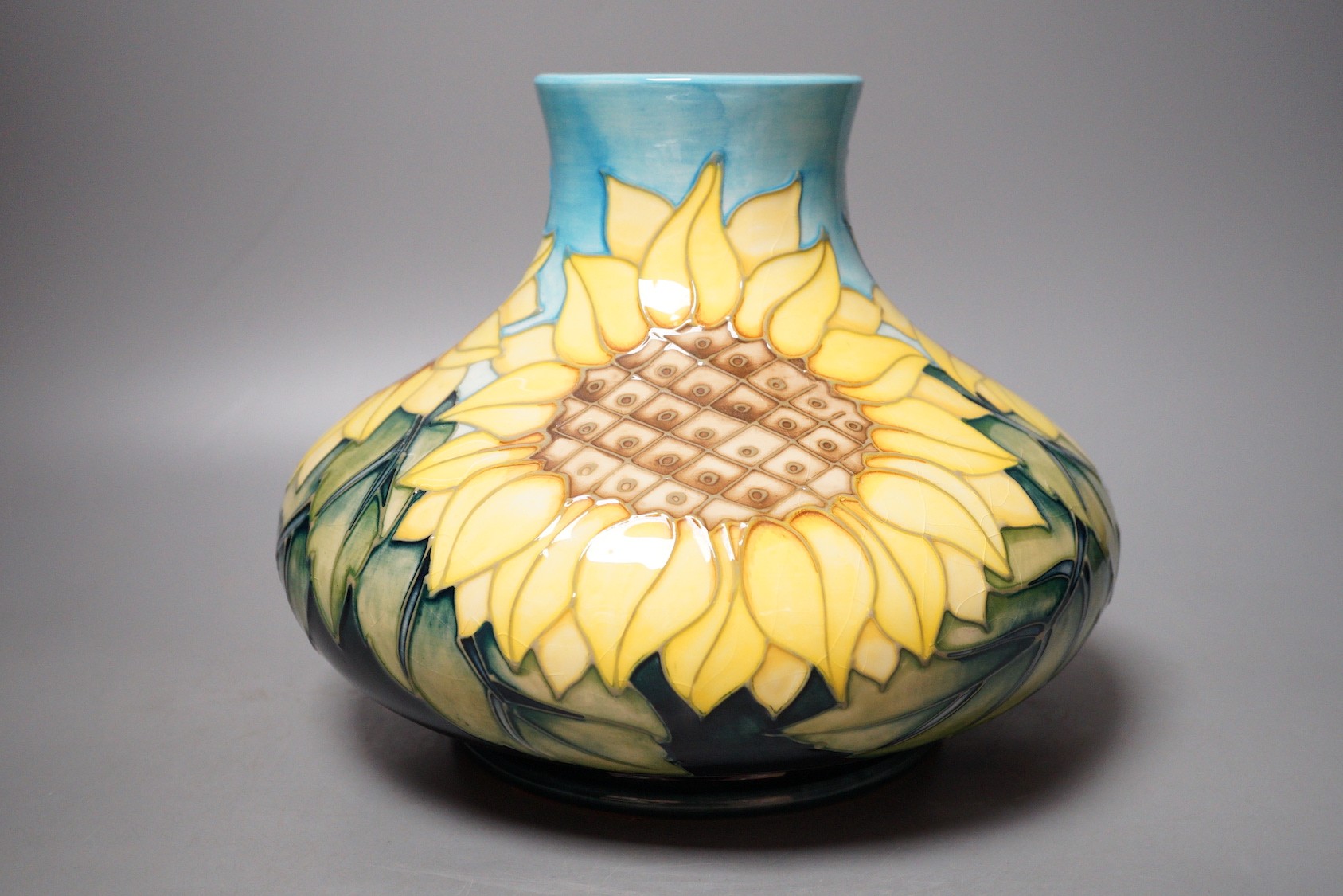 A Moorcroft pottery vase of compressed form, decorated in the 